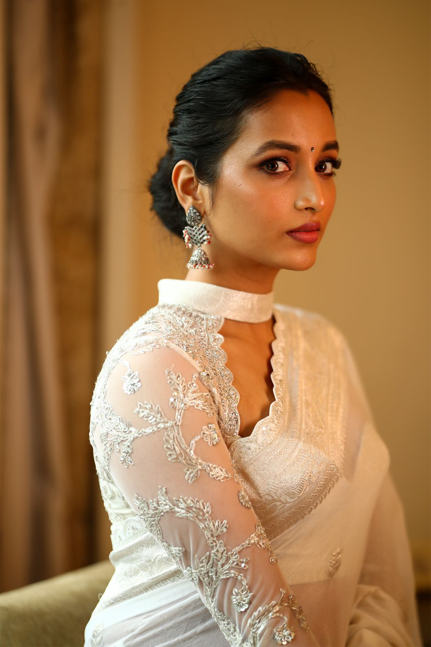 Srinidhi Shetty in White banaras saree paired with embroidered blouse