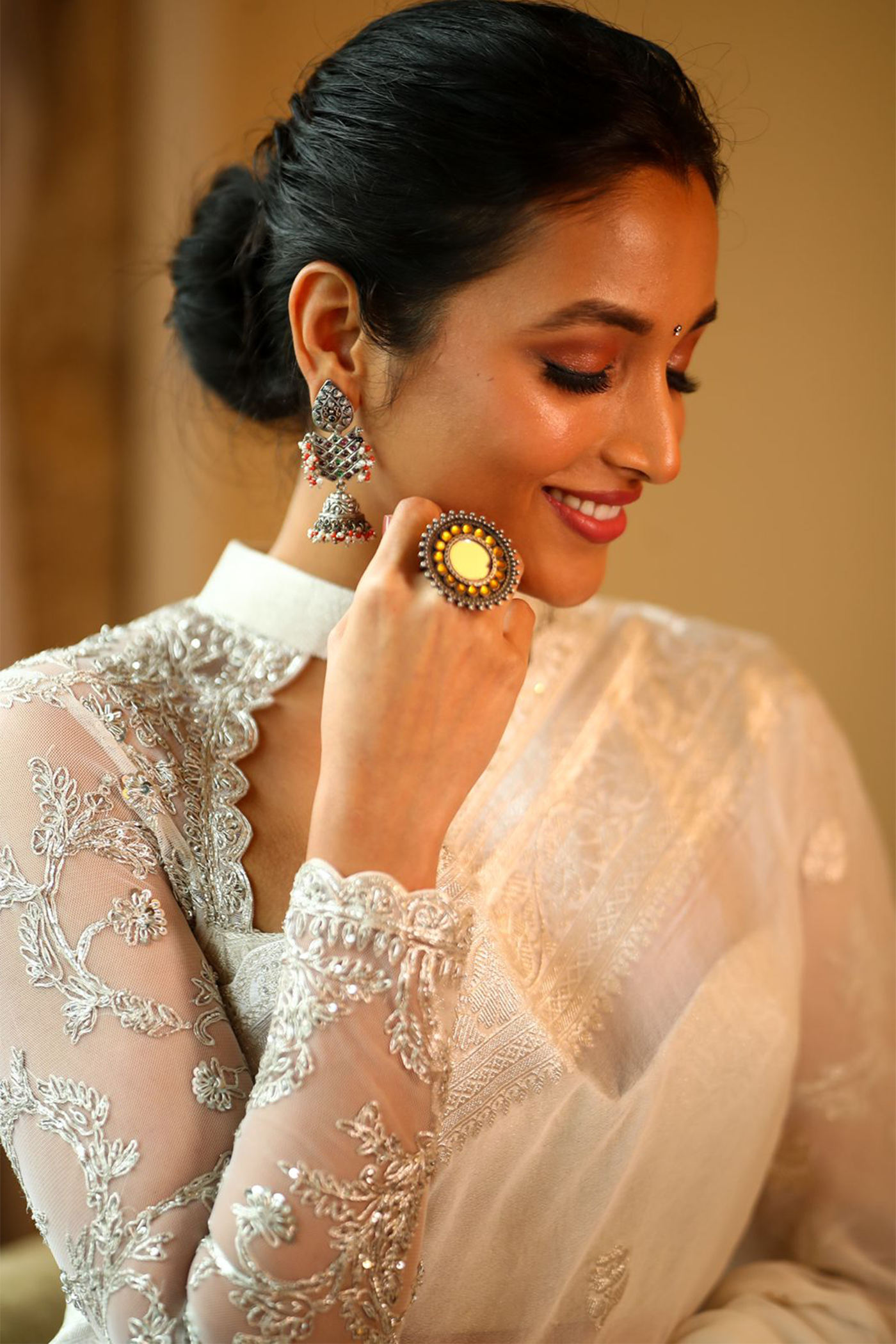 Srinidhi Shetty in White banaras saree paired with embroidered blouse