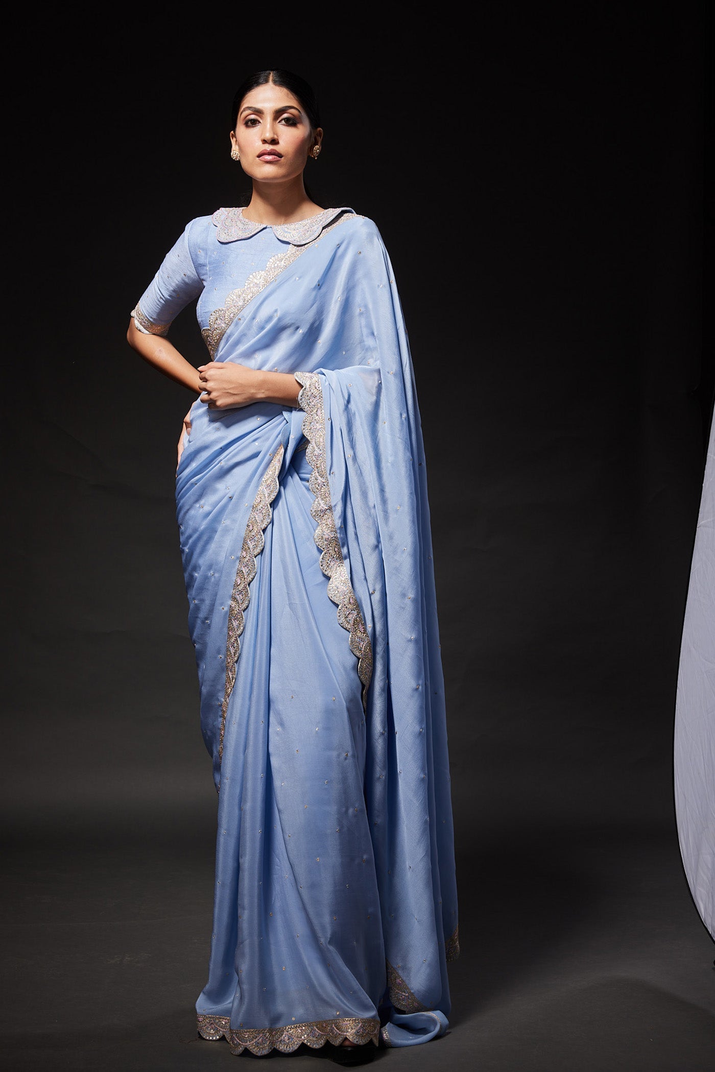 Powder blue scallop embroidered saree with peterpan collared blouse